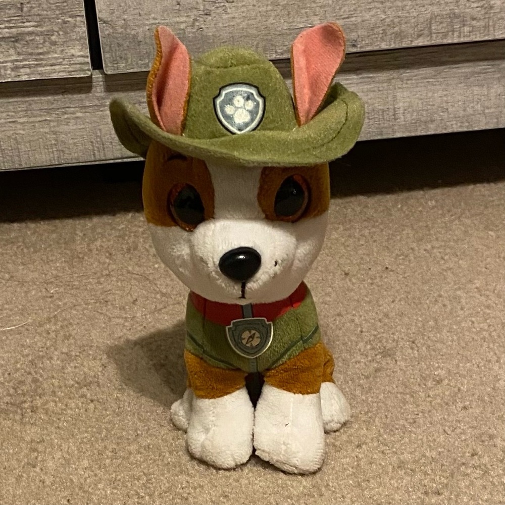 Green and White Plush Dog Toy with Floppy Ears and Friendly Expression